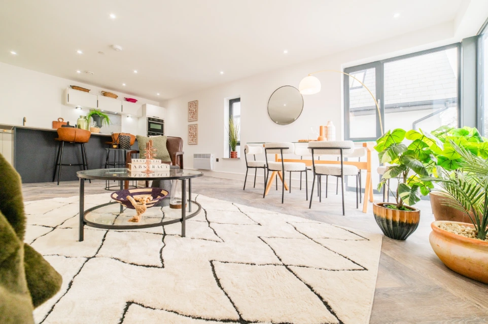 Open-plan kitchen and dining area in high-spec Cardiff apartment development