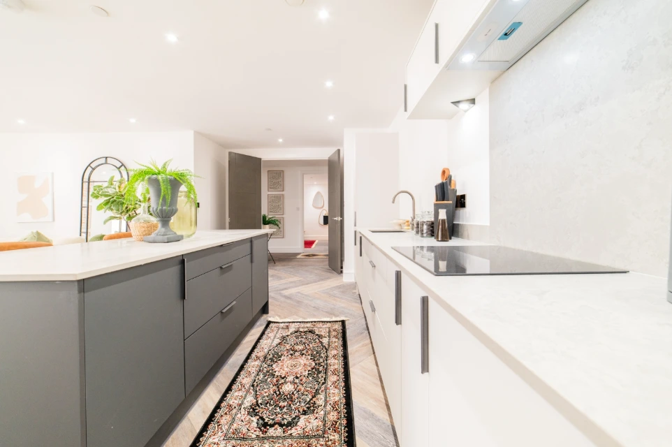 Modern fitted kitchen and hallway in Cardiff luxury apartment refurbishment